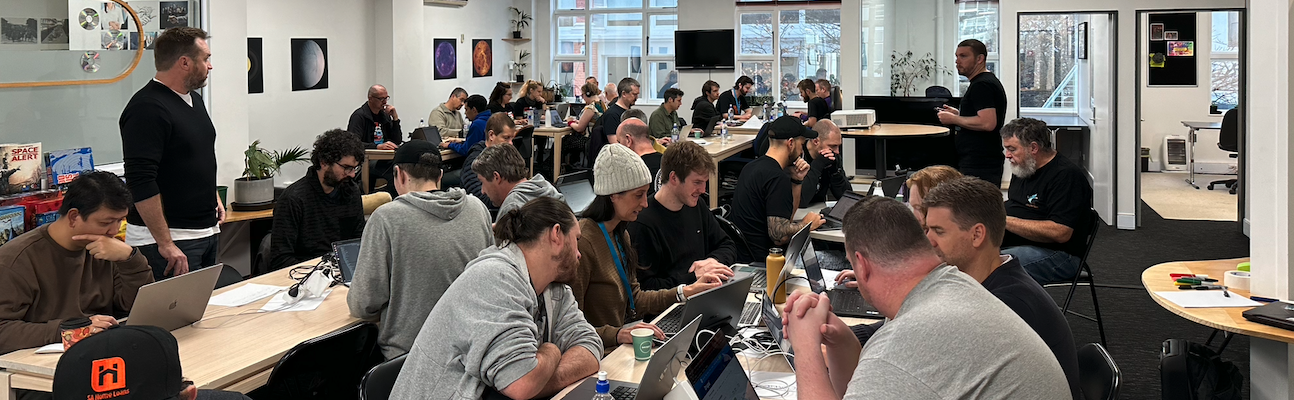 A photo from a previous code sprint held at Xequals, Wellington