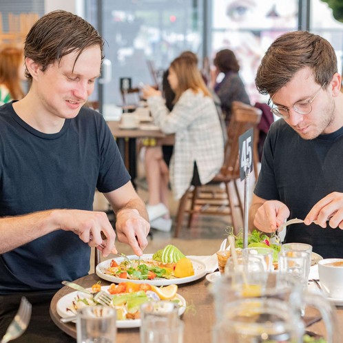 Millennials eating avocado on toast
