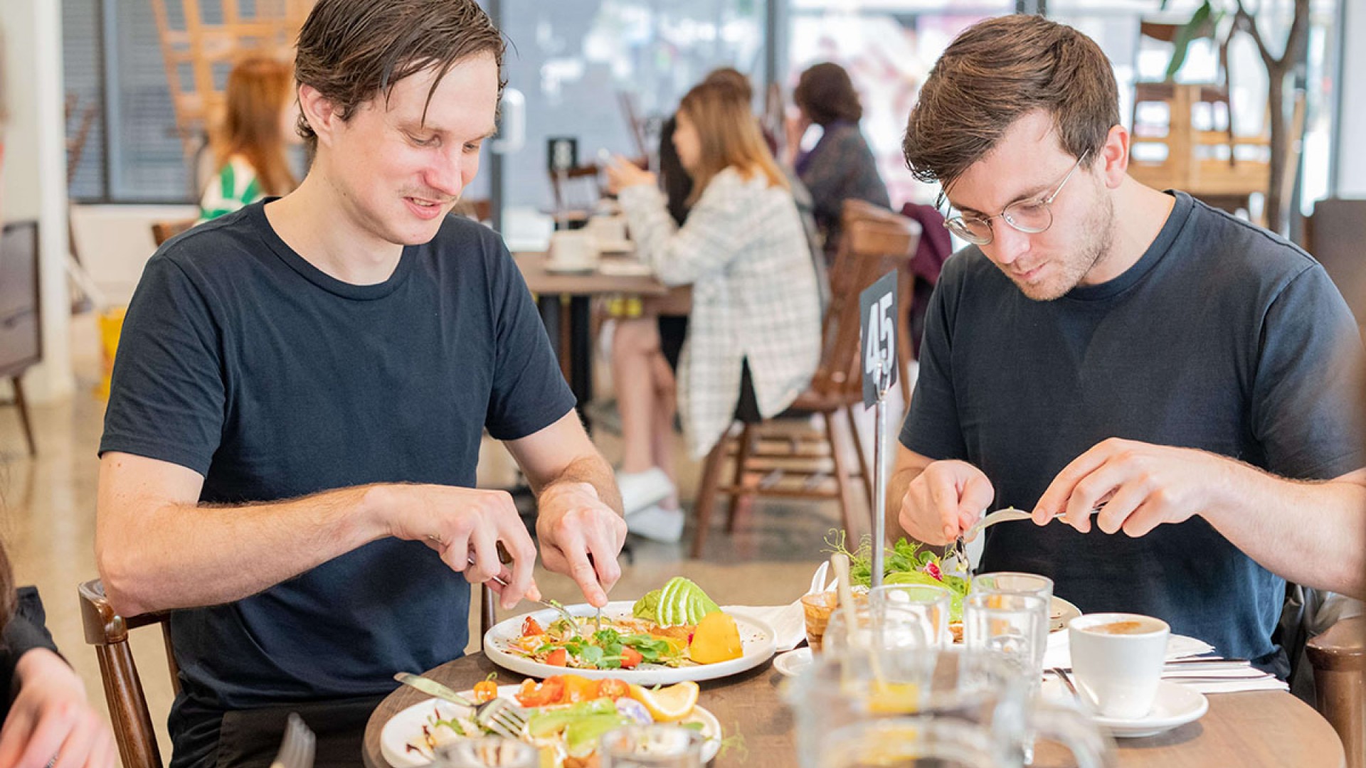 Millennials eating avocado on toast